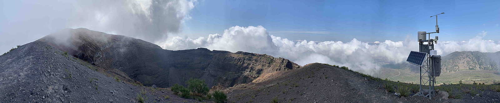 The Gran Cono crater, on Mt. Vesuvius (1281 m asl), from where the last eruption of 1944 took place. It hosts one of the meteorological TROPOMAG network sites. Each site is composed of a pair of stations, one located close to the sea and the other one at higher elevations, but at a short planar distance from the previous one. Here, the low altitude station is installed on the roof of the town hall of Torre del Greco. - Pictures